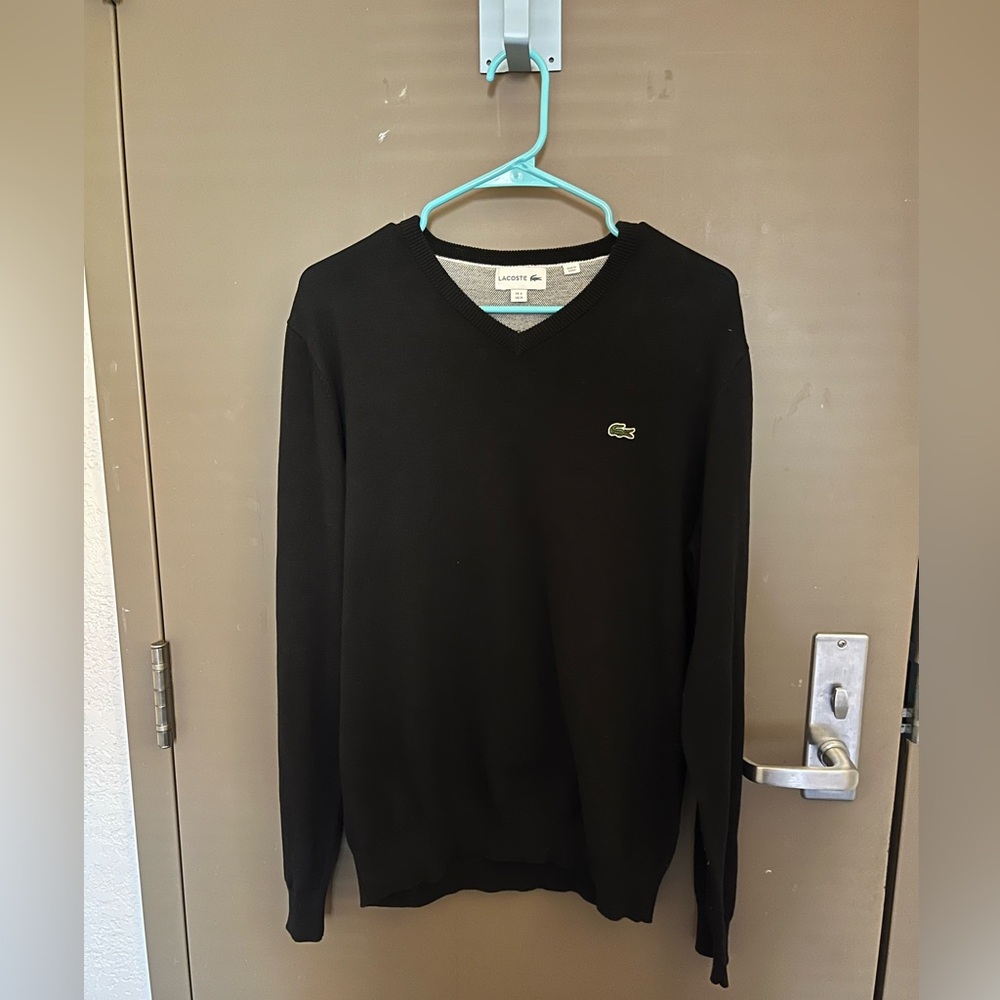 Black Lacoste sweater. Never worn, in brand new condition!